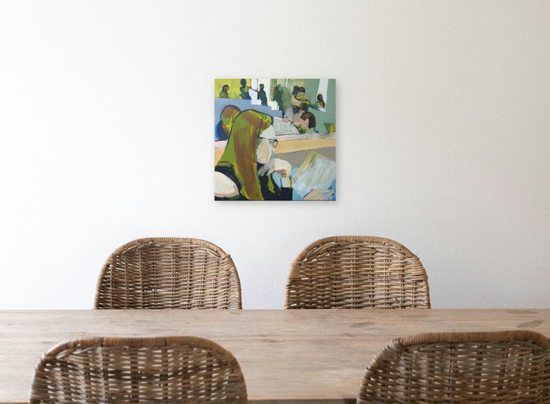 Digital mockup: A Request hung above a wooden dining table with wicker chairs
